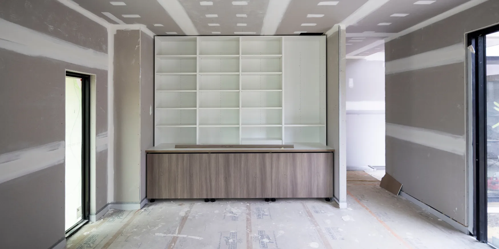 Commercial office renovation in Los Angeles with interior buildout featuring modern ceilings, lighting, and open floor plan